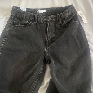 Good American black bootcut jeans